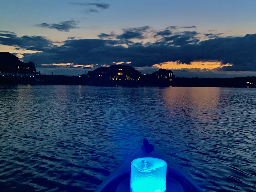 the best sunset kayak trip in north myrtle beach is one with lanterns by J & L Kayaking